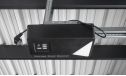 WPC Garage SALLANCHES mit elektrischem Sektionaltor – Wendbare WPC-Dielen in Teak/Anthrazit – 19 m² Innenfläche