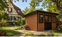 WPC-Gartenhaus MUNSTER | Pultdach | Wandstärke 28mm | Teak | 11m2 Innenfläche